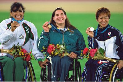 28 Sep 2000:  Louise Sauvage of Australia (centre) wins Gold in the Womens 800m Wheelchair at the Olympic Stadium on Day 13 of the Sydney 2000 Olympic Games in Sydney, Australia. \ Mandatory Credit: Mike Powell /Allsport