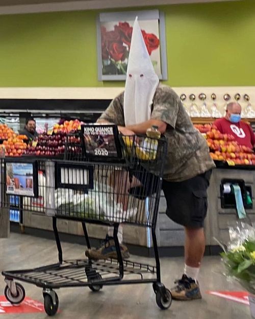 A man wearing a KKK hood while shopping inside a California supermarket has been labelled "blatant racism" and "abhorrent" in May, 2020.