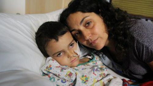 Brain tumour boy in 'stable condition' as parents face court in Spain