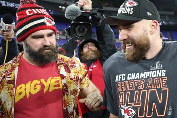 BALTIMORE, MARYLAND - JANUARY 28: Travis Kelce #87 of the Kansas City Chiefs celebrates with his brother Jason Kelce after a 17-10 victory against the Baltimore Ravens in the AFC Championship Game at M&amp;T Bank Stadium on January 28, 2024 in Baltimore, Maryland. (Photo by Rob Carr/Getty Images)
