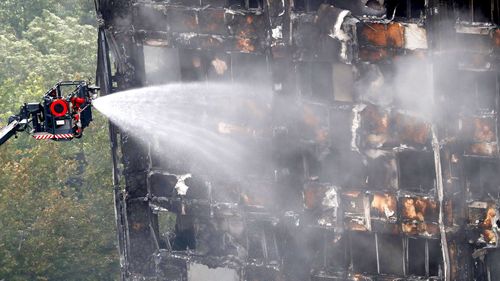 The inquiry aims to find out how the blaze started and spread and prevent another tragedy. (AP)