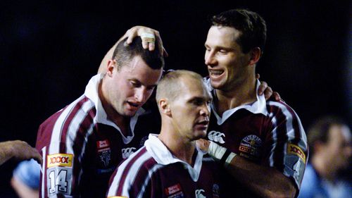 Chris Walker, left, played six times for Queensland in the State of Origin.