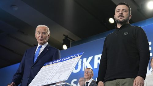 President Joe Biden, left, and President of Ukraine Volodymyr Zelenskyy at he NATO Summit.