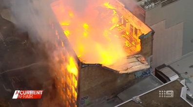 A wall of the building that caught fire in Sydney collapsed.