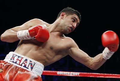 Amir Khan wore boxing shorts worth $36,000 in a bout in 2014. (AAP)