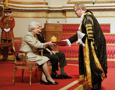 Queen Elizabeth II accompanied by Prince Philip, Duke of Edinburgh receives a copy of the loyal address from the Lord Mayor of London Alderman David Wootton during a presentation of loyal addresses by the privileged bodies at a ceremony to mark the Queen's Diamond Jubilee at Buckingham Palace on March 27, 2012 in London 