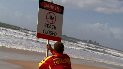 Surf lifesaving Queensland are urging people to stay safe with beaches closed due to dangerous surf and strong winds.