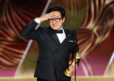 Ke Huy Quan accepts the Best Supporting Actor in a Motion Picture award for "Everything Everywhere All at Once" onstage at the 80th Annual Golden Globe Awards