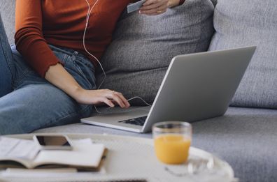 Woman shopping using computer