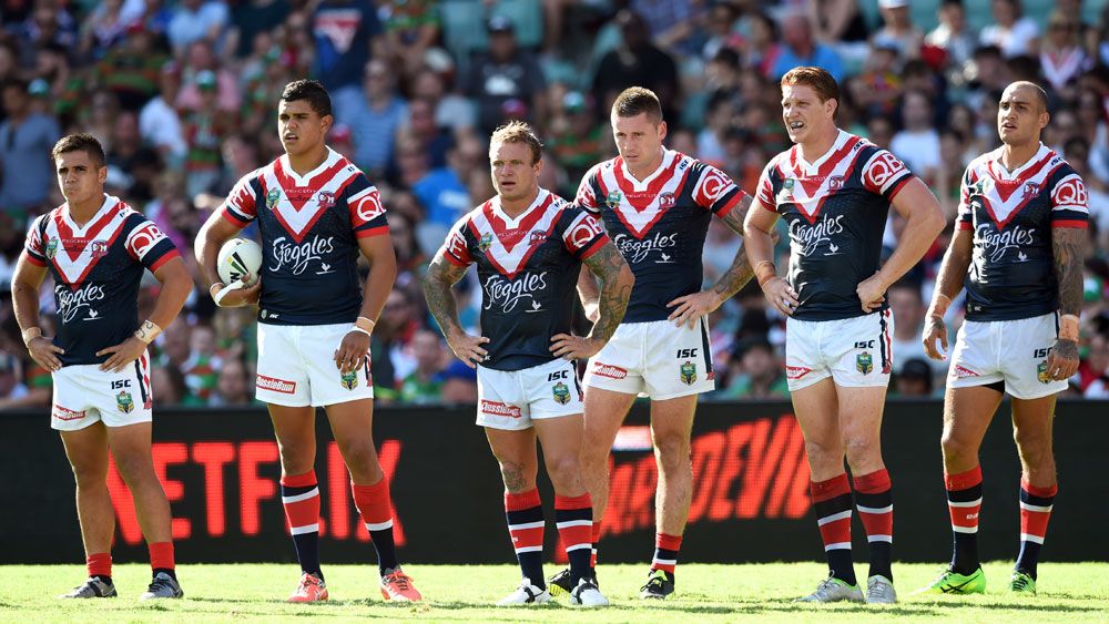 Sydney Roosters players reflect after conceding a try against Souths. (AAP)  