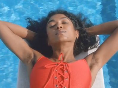 Razor ad features womens body hair