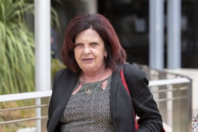 Kim Dorsett leaves the inquest into the Dreamworld disaster at the Southport Courthouse on the Gold Coast, Friday, December 7, 2018. (AAP Image/Glenn Hunt) 