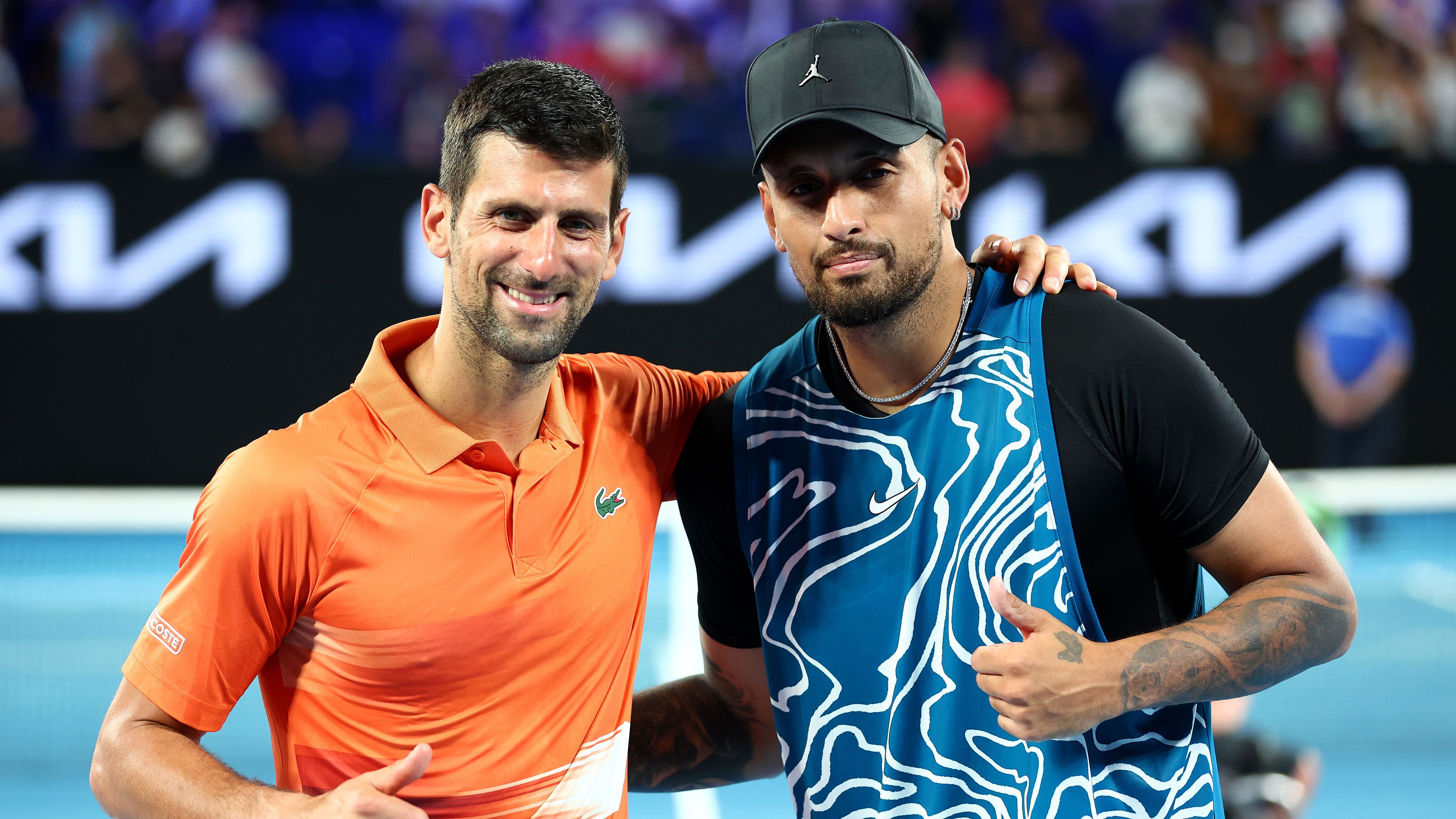 Novak Djokovic and Nick Kyrgios pose for a photo following their Arena Showdown charity match.