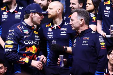 Race winner Max Verstappen of Red Bull Racing talks with team principal Christian Horner as they celebrate after the Bahrain Grand Prix. 