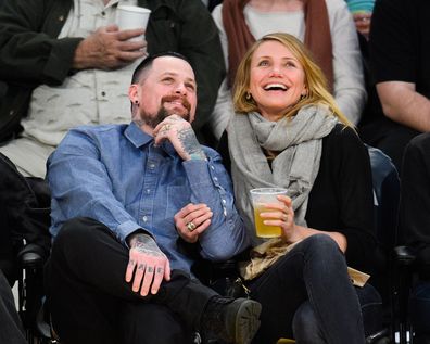 Benji Madden  and Cameron Diaz attend a basketball game between the Washington Wizards and the Los Angeles Lakers at Staples Center on January 27, 2015 in Los Angeles, California.