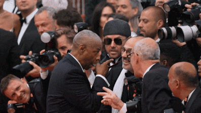 Cannes red carpet denzel washington looper photographer