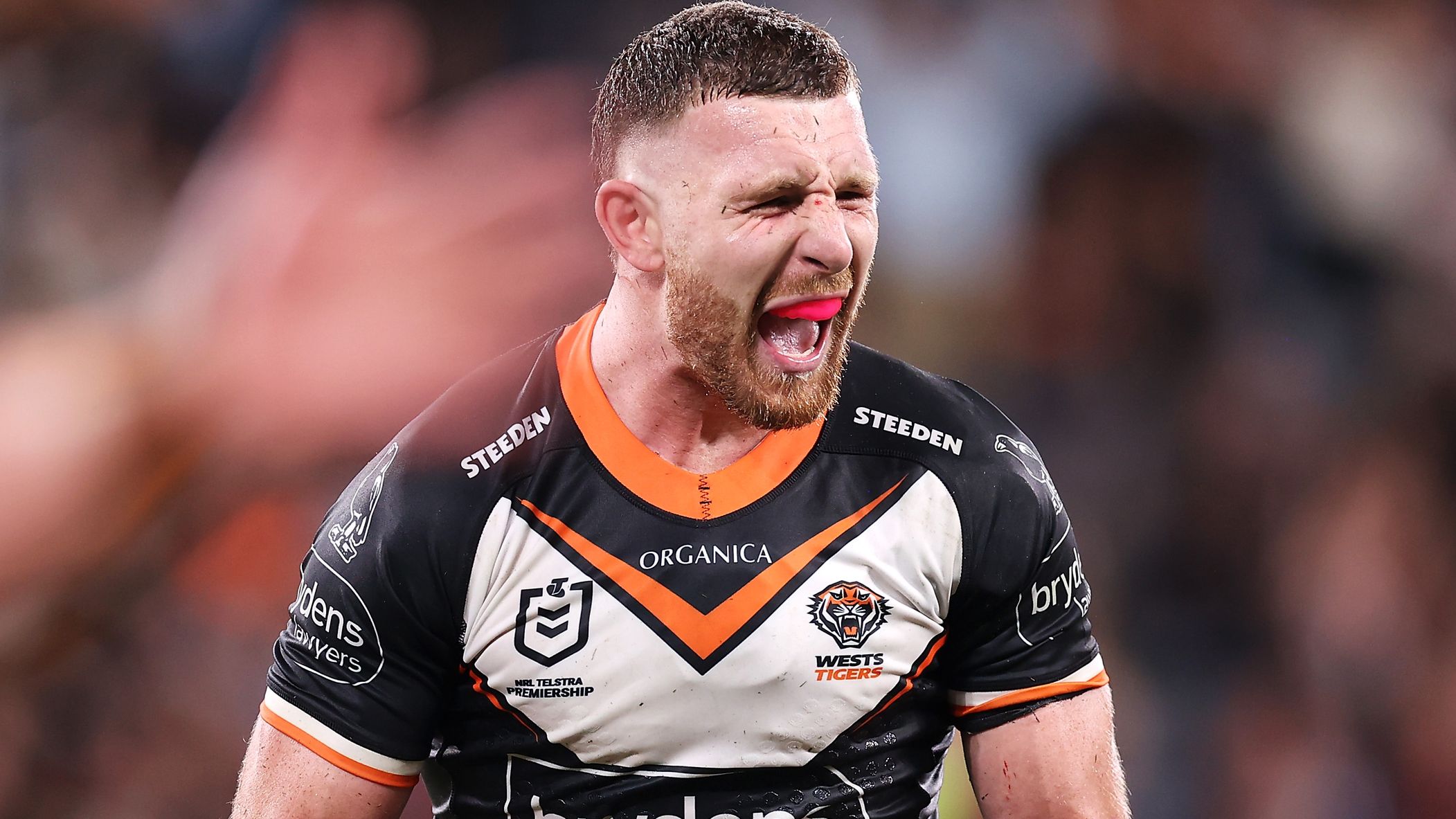 Jackson Hastings of the Tigers celebrates victory over South Sydney Rabbitohs.