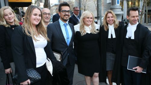 Rebel Wilson with her legal team as she leaves the Victorian Supreme Court after winning her case, Thursday, June 15, 2017. (AAP)