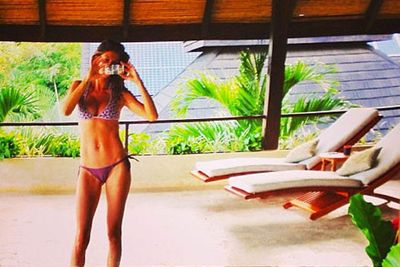 Just five months after giving birth yummy mummy Gisele took to Twitter to flaunt her gorgeous body, sharing a flawless Instagram shot of herself in a bikini.