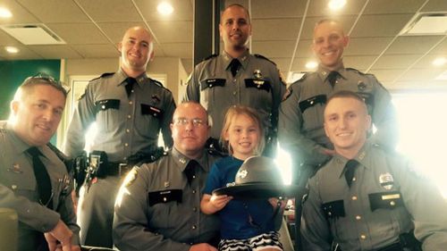 Young girl uses allowance to buy ice cream for mourning police officers