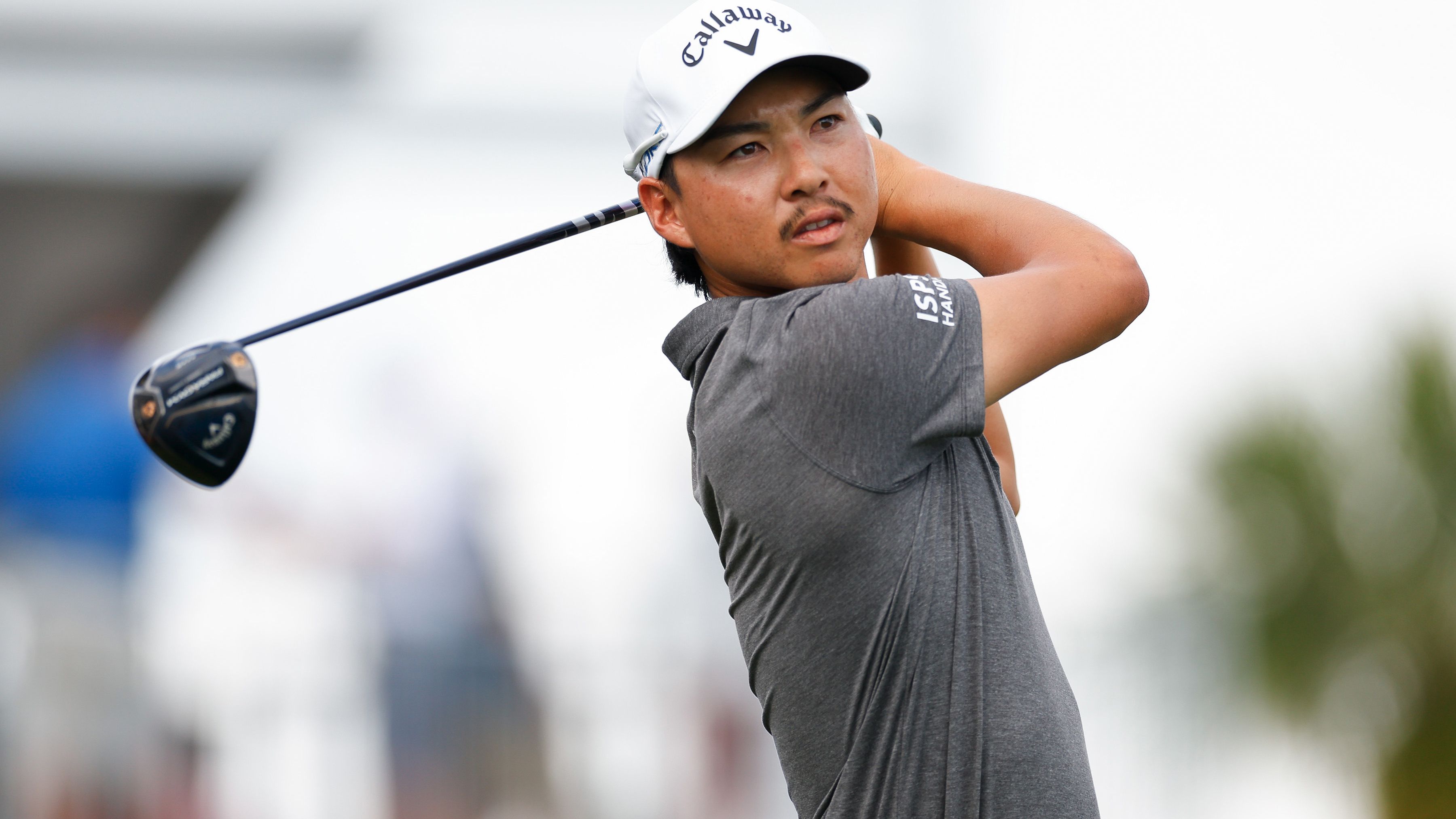 Min Woo Lee of Australia hits a tee shot at the Arnold Palmer Invitational.