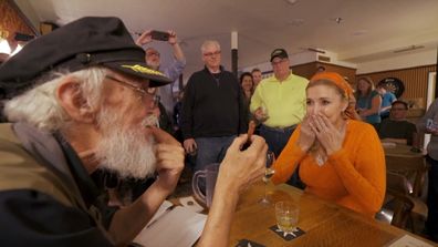 Catriona Rowntree trying sour toe cocktail in mining town in Canada