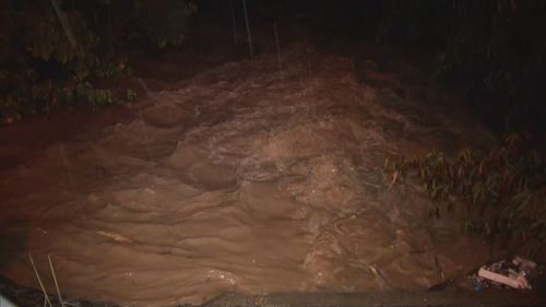 Heavy rain causes flood in Queensland.