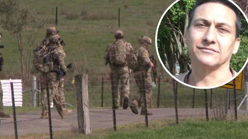 Manhunt for accused gunman Dezi Freeman