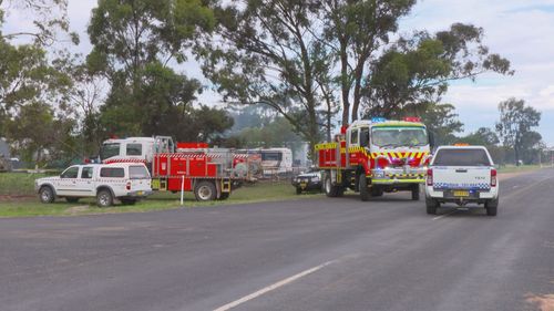 Firefighters at the scene of the Bribbaree house fire.