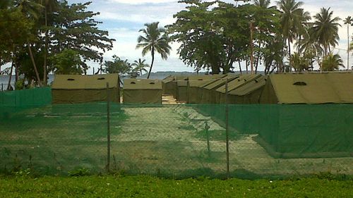 Detainees leading boy to Manus Island centre may have sparked shooting