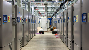 This photo provided by Pfizer shows part of a &quot;freezer farm,&quot; a football field-sized facility for storing finished COVID-19 vaccines, under construction in Kalamazoo, Michigan. Pfizer&#x27;s experimental vaccine requires ultracold storage, at about -70°C.  (Jeremy Davidson/Pfizer via AP)