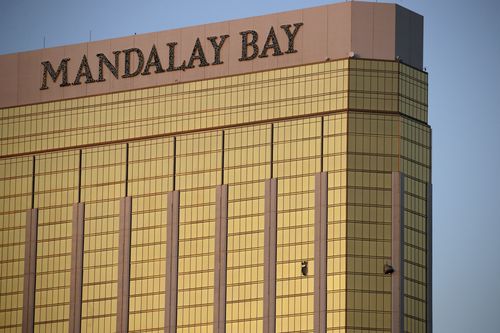 Drapes billow out of broken windows at the Mandalay Bay resort and casino on the Las Vegas Strip, following a deadly shooting at a music festival in Las Vegas. Stephen Paddock, 64, fired more than 1,100 rounds of ammunition from his suite on the 32nd floor of the Mandalay Bay Hotel on the night of October 1, 2017. It took 11 minutes for him to kill 58 people and wound more than 400.