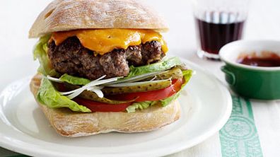 Beef burger with cheddar and pickles