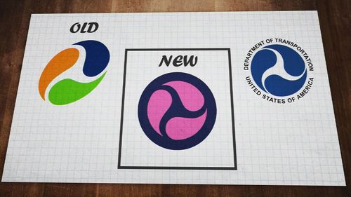 Queensland's public transit agency has defended the cost to develop an altered version of its current logo.