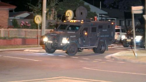 Police deployed an armoured Bearcat vehicle to the scene. (9NEWS)