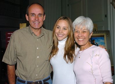 Amanda Bynes (center) with parents Rick and Lynn Bynes at the American Film Market media breakfast 4 November 2004 