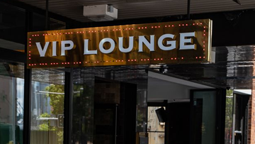 Signage such as this &#x27;VIP lounge&#x27; on Oxford street, Darlinghurst, will have to be removed within three months under the new legislation.