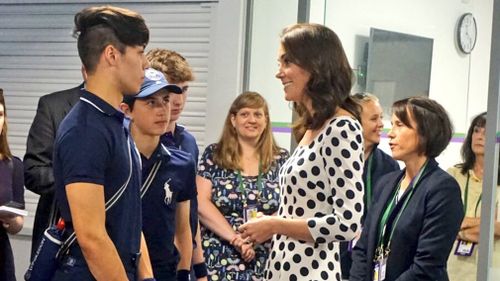 The royal met with ball boys and girls before competition began. (Twitter)