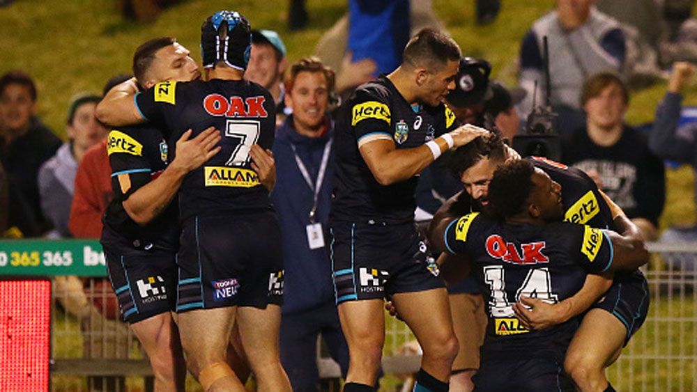 Panthers players celebrate a try in 2015. (Getty)