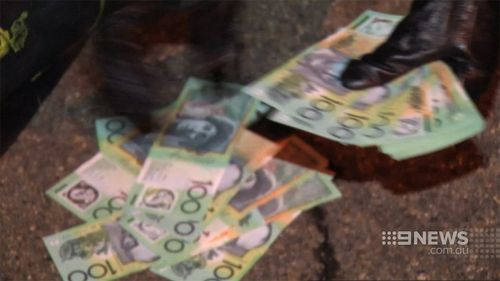 $100,000 in cash was seized. (9NEWS)