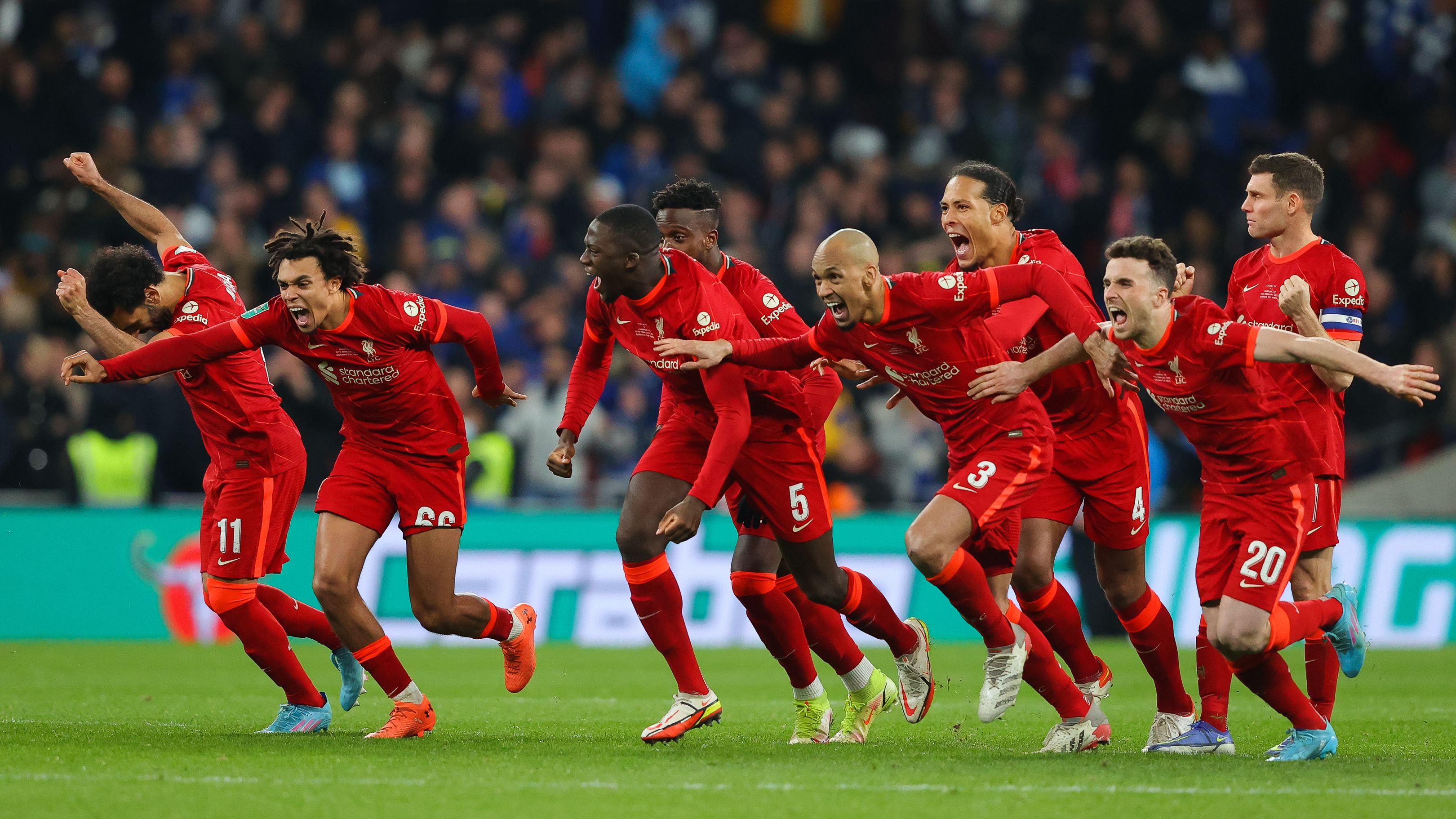 Liverpool players celebrate the winning penalty during the Carabao Cup Final.