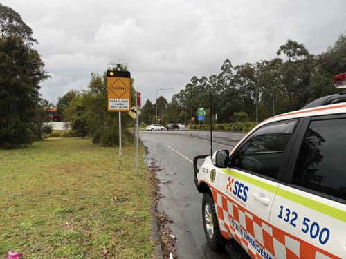 A woman is missing after being swept away in floodwaters in the NSW Hunter region as large parts of the state are drenched by heavy rain.