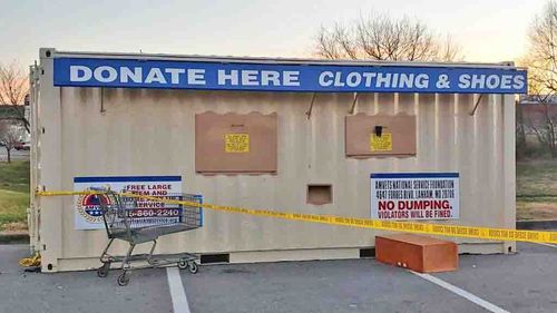 Police arrived to find the man's body protruding from the bin.