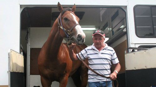 Joe Janiak with his beloved horse Takeover Target. (AAP)