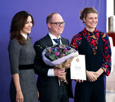 Princess Mary recycles favourite Prada dress for the sixth time as she returns to Denmark