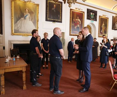 NMA Solo - Prince and Princess of Wales visit the Guildhall Windsor to thank volunteers and staff that worked on the funeral of HM Queen Elizabeth II, the couple spoke to people standing next to a portrait of Queen Elizabeth II donated to the borough of Windsor by HM The queen in 1955