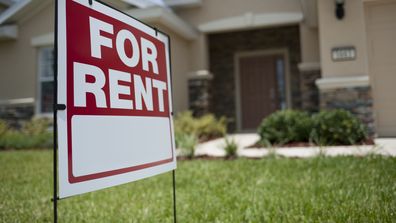 For Rent sign in front of new house