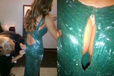 Now here's a woman whose proud of a wardrobe malfunction! Sofia Vergara's buttocks got their moment in the spotlight after busting out of her sexy Zuhair Murad dress mid-Emmys.. the actress even tweeted a pic of the erm, broken zip. <br/>