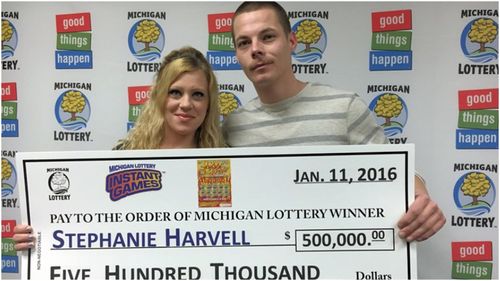 A US couple who won half a million dollars on a state lottery scratchie has been charged over a string of burglaries.