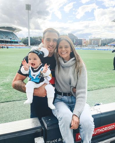 AFL star Jeremy Finlayson, partner Kellie Gardner and their daughter Sophia.